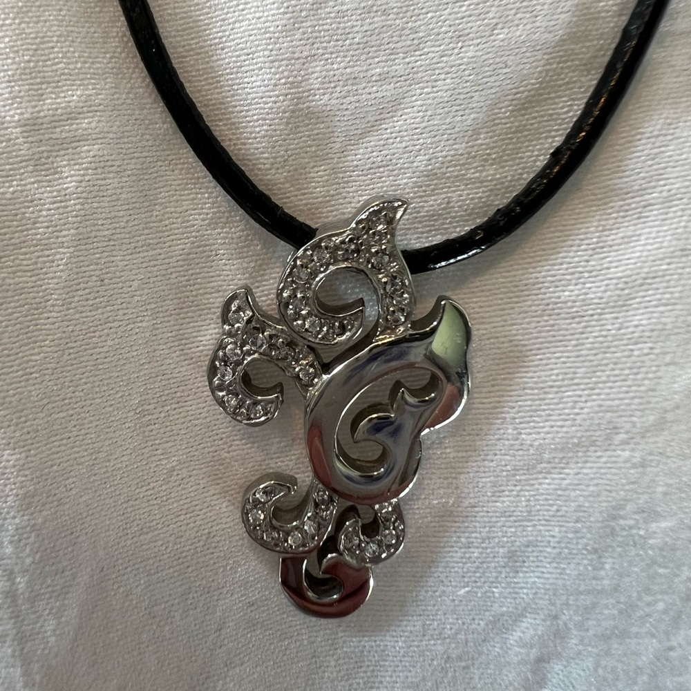 Silver and jewel accent on leather rope necklace by Chisel